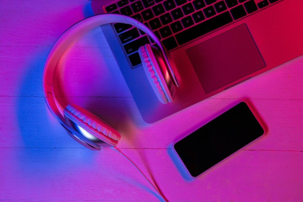 top-view-of-set-of-gadgets-in-purple-neon-light-e1669606669828